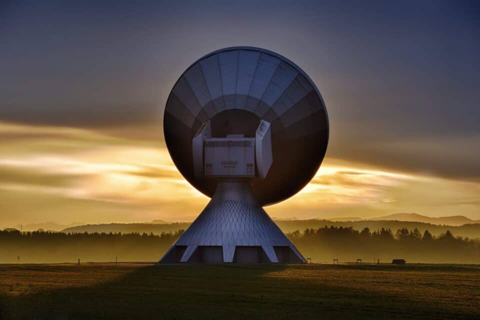 Image of a satellite station at dawn