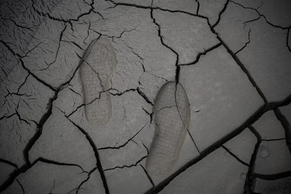 Image of dried out clay with foot prints