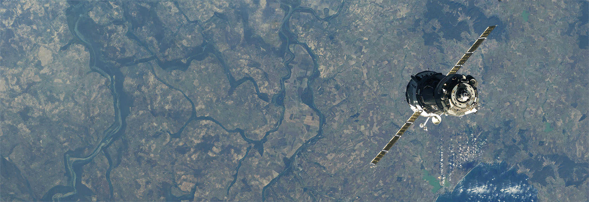 Image of an earth observation satellite orbiting the earth
